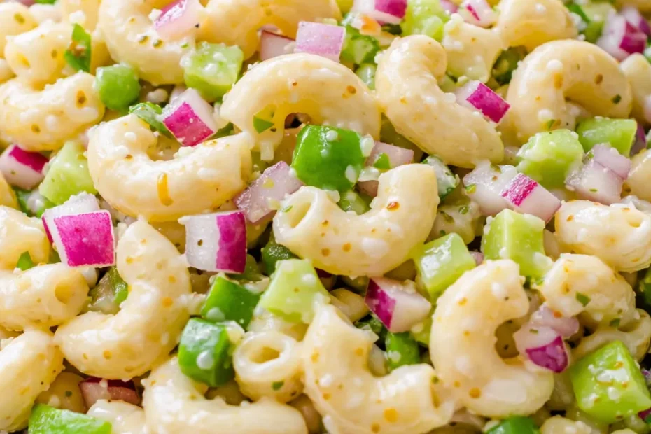Creamy classic macaroni salad with tender pasta, crunchy vegetables, and a tangy dressing, never soggy.