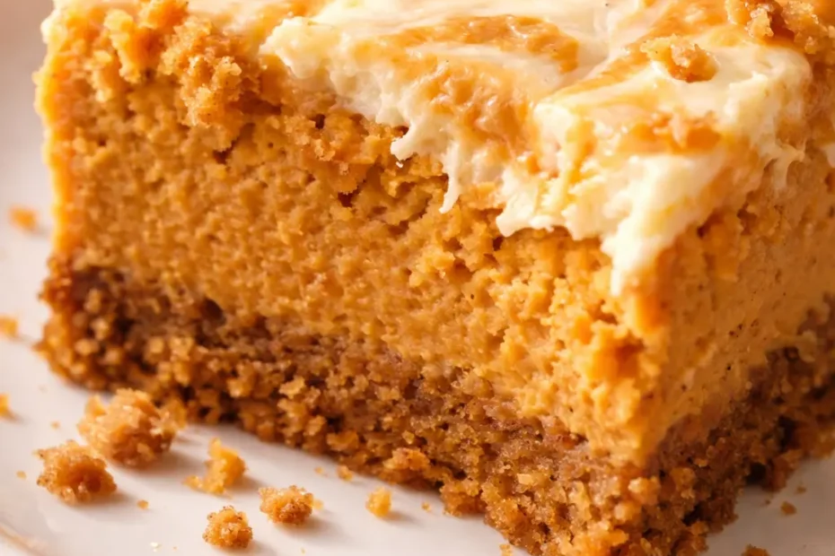 Creamy gluten free pumpkin pie cheesecake bars with spiced pumpkin swirl and golden graham cracker crust, an indulgent dessert
