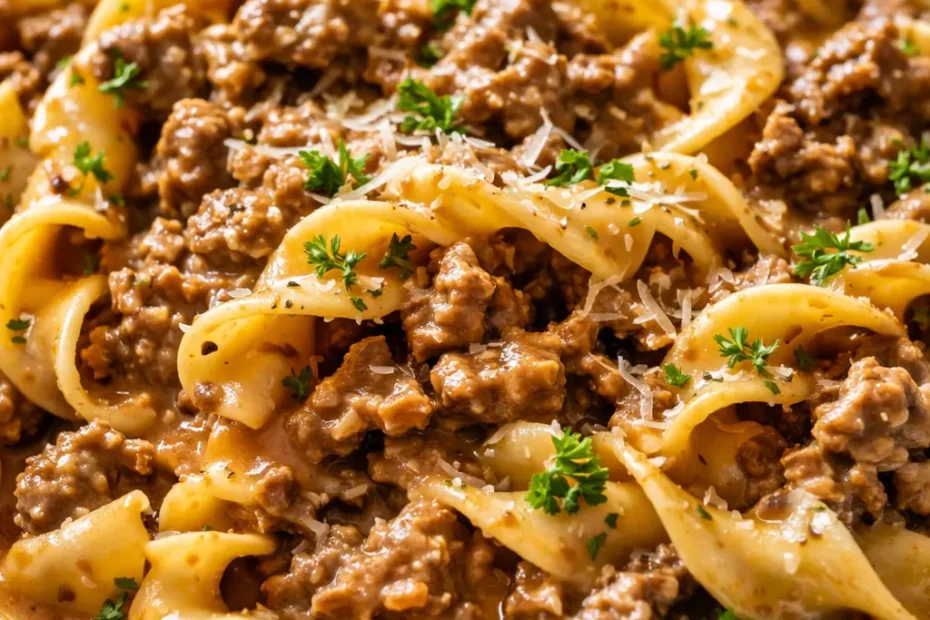 Rich and creamy ground beef stroganoff with tender ground beef in a velvety sauce, served over egg noodles.