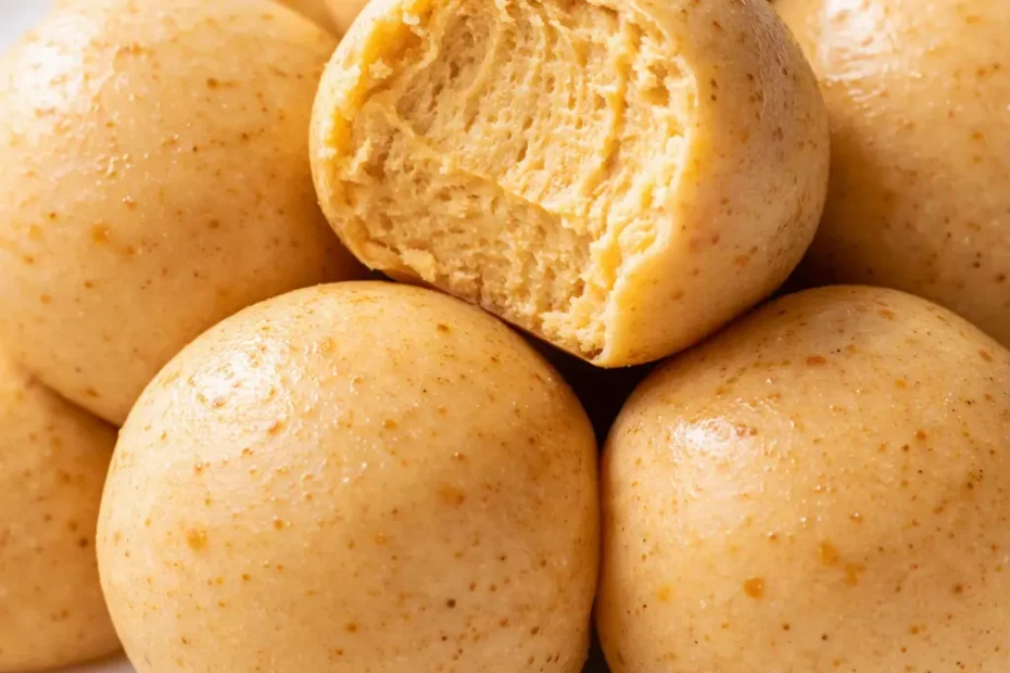 No-Bake Pumpkin Cheesecake Truffles with a creamy, spiced center and golden crumble coating.